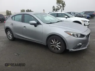 2014 Mazda 3 i Grand Touring with VIN JM1BM1M74E1106463, listed as a Copart auction lot 85144434 with 122,729 mi miles and Salvage Title. Bid and sale history available at DreamBid. Image 4.