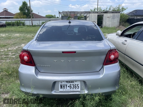 2014 Dodge Avenger SE with VIN 1C3CDZAB8EN149812, listed as a IAAI auction lot 42092082 with 126,244 mi miles and . Bid and sale history available at DreamBid. Image 12.