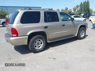 2003 Dodge Durango SLT z VIN 1D4HS48N43F517701, wystawiony jako IAAI lot #42277135 z przebiegiem 135 521 mil mil oraz . Historia ofert i sprzedaży dostępna na DreamBid. Obrazek 4.