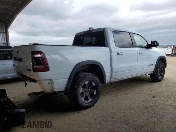 2019 Ram 1500 Rebel z VIN 1C6SRFLTXKN618849, wystawiony jako Copart lot #50419595 z przebiegiem 98 219 mil mil oraz Szkoda całkowita • Salvage title. Historia ofert i sprzedaży dostępna na DreamBid. Obrazek 3.