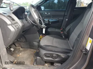 2013 Ford Utility Police Interceptor with VIN 1FM5K8AR0DGA89928, listed as a Copart auction lot 71360004 with 194,209 mi miles and Salvage Title. Bid and sale history available at carsss.com. Image 7.