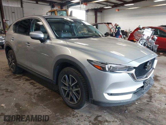 2018 Mazda CX-5 Grand Touring with VIN JM3KFBDM4J0350420, listed as a IAAI auction lot 41881566 with 96,515 mi miles. Bid and sale history available at carsss.com. Image 1.