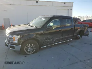 2018 Ford F-150 XL with VIN 1FTEW1EG1JFD54060, listed as a Copart auction lot 43202705 with 121,884 mi miles and Salvage Title. Bid and sale history available at carsss.com. Image 1.