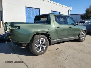 2023 Rivian R1T Adventure with VIN 7FCTGAAA7PN024633, listed as a Copart auction lot 41481365 with 24,965 mi miles and Salvage Title. Bid and sale history available at carsss.com. Image 3.