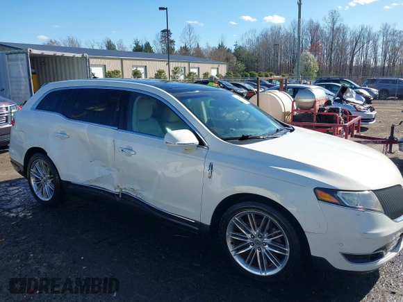 2013 Lincoln MKT EcoBoost with VIN 2LMHJ5AT8DBL55167, listed as a IAAI auction lot 41894396 with 121,114 mi miles. Bid and sale history available at carsss.com. Image 1.