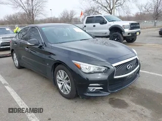 2015 Infiniti Q50 with VIN JN1BV7AR6FM412573, listed as a IAAI auction lot 41796802 with 136,410 mi miles. Bid and sale history available at carsss.com. Image 1.