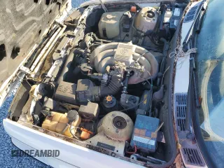 1991 BMW 3 Series z VIN WBABB231XMEC25523, wystawiony jako Copart lot #81332334 z przebiegiem 7 214 mil mil oraz Czysty tytuł • Clean title. Historia ofert i sprzedaży dostępna na DreamBid. Obrazek 11.