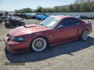 2004 Ford Mustang GT Deluxe with VIN 1FAFP42X64F128596, listed as a Copart auction lot 60336785 with 221,871 mi miles and Salvage title. Bid and sale history available at DreamBid. Image 1.