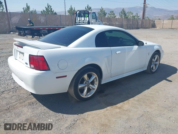 2000 Ford Mustang with VIN 1FAFP4049YF308623, listed as a IAAI auction lot 42708683 with 135,121 mi miles and . Bid and sale history available at DreamBid. Image 4.