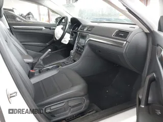 2016 Volkswagen Passat SE z VIN 1VWBT7A32GC057162, wystawiony jako IAAI lot #42287908 z przebiegiem 32 127 mil mil oraz . Historia ofert i sprzedaży dostępna na DreamBid. Obrazek 5.