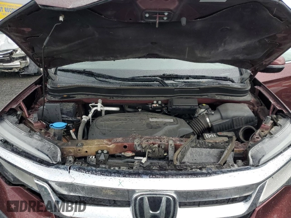 2019 Honda Pilot Touring 8-Passenger with VIN 5FNYF6H94KB056213, listed as a Copart auction lot 56429585 with 106,735 mi miles and Salvage title. Bid and sale history available at DreamBid. Image 12.
