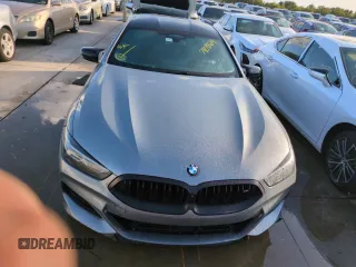 2023 BMW 8 Series M850i with VIN WBAGV8C02PCL20503, listed as a Copart auction lot 74098614 with Not Provided miles and Salvage Title. Bid and sale history available at carsss.com. Image 5.