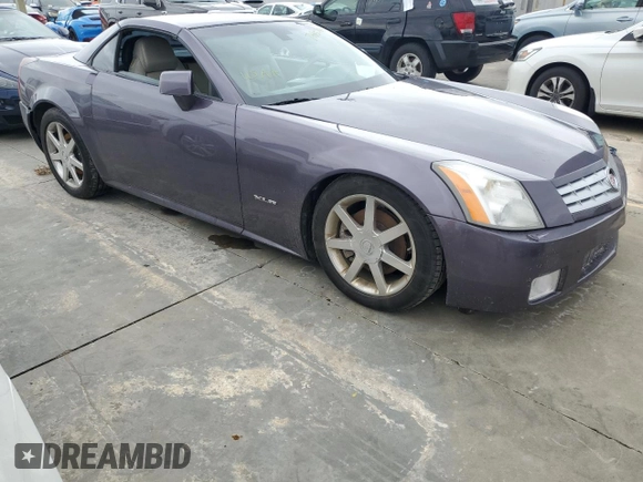 2004 Cadillac XLR z VIN 1G6YV34AX45600514, wystawiony jako Copart lot #74852854 z przebiegiem 37 941 mil mil oraz Nie do naprawy • Non repairable. Historia ofert i sprzedaży dostępna na DreamBid. Obrazek 4.