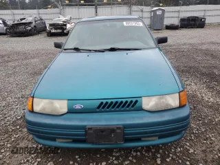 1995 Ford Escort z VIN 1FASP1284SW307142, wystawiony jako Copart lot #88531955 z przebiegiem 93 323 mil mil oraz Szkoda całkowita • Salvage title. Historia ofert i sprzedaży dostępna na DreamBid. Obrazek 5.