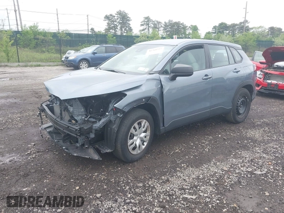 2022 Toyota Corolla Cross L with VIN 7MUAAABG0NV024424, listed as a IAAI auction lot 42261227 with 20,171 mi miles and . Bid and sale history available at DreamBid. Image 2.