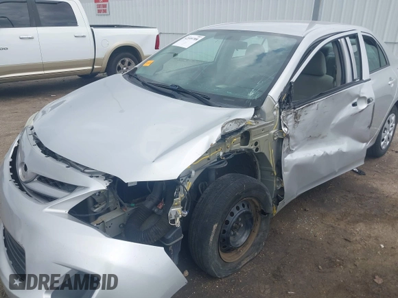 2013 Toyota Corolla L with VIN 5YFBU4EE8DP161765, listed as a IAAI auction lot 42109708 with 105,931 mi miles and . Bid and sale history available at DreamBid. Image 6.
