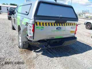 2023 Ford F-150 XL with VIN 1FTNF1E5XPKF47161, listed as a IAAI auction lot 42171620 with 14,623 mi miles and . Bid and sale history available at DreamBid. Image 3.