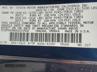 2006 Toyota Tacoma with VIN 5TEPX42N06Z231502, listed as a Copart auction lot 83566484 with 113,235 mi miles and Salvage Title. Bid and sale history available at carsss.com. Image 12.