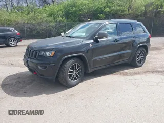 2017 Jeep Grand Cherokee Trailhawk with VIN 1C4RJFLG3HC674489, listed as a IAAI auction lot 42049006 with 91,892 mi miles and . Bid and sale history available at DreamBid. Image 2.