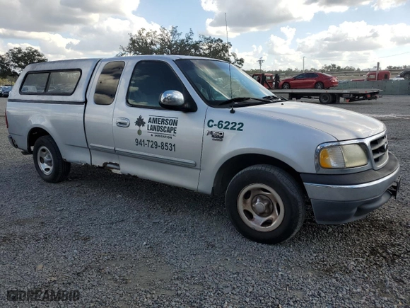 2001 Ford F-150 Work Series with VIN 2FTRX17W21CA26757, listed as a Copart auction lot 79602654 with 0 mi miles and Non Repairable. Bid and sale history available at carsss.com. Image 4.