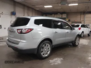 2013 Chevrolet Traverse LT with VIN 1GNKVGKD8DJ107615, listed as a IAAI auction lot 41785699 with 173,646 mi miles and . Bid and sale history available at DreamBid. Image 4.