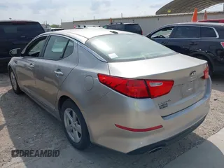 2014 Kia Optima LX z VIN 5XXGM4A70EG282927, wystawiony jako IAAI lot #42132840 z przebiegiem 88 650 mil mil oraz . Historia ofert i sprzedaży dostępna na DreamBid. Obrazek 3.