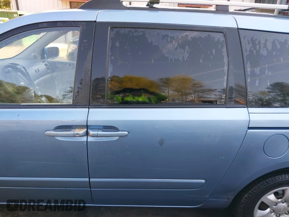 2007 Kia Sedona EX with VIN KNDMB233376173452, listed as a IAAI auction lot 41994451 with 201,849 mi miles. Bid and sale history available at carsss.com. Image 14.