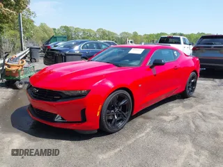 2020 Chevrolet Camaro 1LT with VIN 1G1FB1RX1L0113401, listed as a IAAI auction lot 42018427 with 61,603 mi miles and . Bid and sale history available at DreamBid. Image 2.