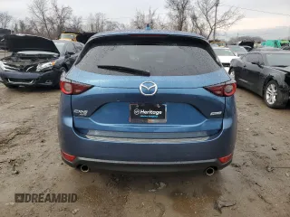 2018 Mazda CX-5 Touring with VIN JM3KFBCM0J0363036, listed as a Copart auction lot 47085755 with 61,928 mi miles and Salvage Title. Bid and sale history available at DreamBid. Image 6.