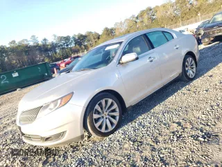 2014 Lincoln MKS with VIN 1LNHL9DKXEG604580, listed as a Copart auction lot 50388885 with 197,070 mi miles and Clean Title. Bid and sale history available at carsss.com. Image 1.