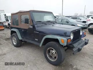 1998 Jeep Wrangler SE with VIN 1J4FY29P9WP792089, listed as a IAAI auction lot 41794793 with 200,838 mi miles. Bid and sale history available at carsss.com. Image 1.