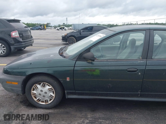 1998 Saturn SL с VIN 1G8ZH5280WZ295857, выставлен на аукционе IAAI как лот 42238789 с пробегом 153 163 миль миль и . История ставок и продаж доступна на DreamBid. Изображение 19.