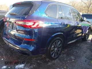 2020 BMW X5 M50i with VIN 5UXJU4C03LL227857, listed as a IAAI auction lot 41351112 with 65,325 mi miles and . Bid and sale history available at DreamBid. Image 4.