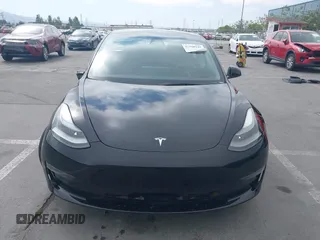 2023 Tesla Model 3 with VIN 5YJ3E1EA5PF647737, listed as a IAAI auction lot 42430145 with 20,525 mi miles and . Bid and sale history available at DreamBid. Image 12.