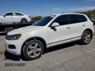 2012 Volkswagen Touareg Lux z VIN WVGEF9BP1CD010953, wystawiony jako Copart lot #60849115 z przebiegiem 153 975 mil mil oraz Szkoda całkowita • Salvage title. Historia ofert i sprzedaży dostępna na DreamBid. Obrazek 1.