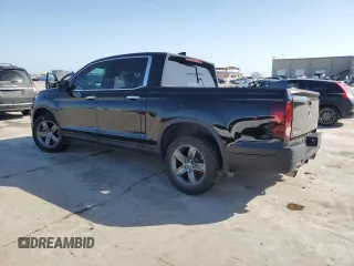 2023 Honda Ridgeline RTL-E with VIN 5FPYK3F72PB001592, listed as a Copart auction lot 52154625 with 41,153 mi miles and Salvage title. Bid and sale history available at DreamBid. Image 2.