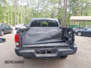 2022 Toyota Tacoma SR with VIN 3TYAX5GN1NT042099, listed as a IAAI auction lot 42081791 with 38,621 mi miles and . Bid and sale history available at DreamBid. Image 17.