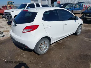 2014 Mazda 2 Sport with VIN JM1DE1KY0E0175562, listed as a IAAI auction lot 42023803 with 247,411 mi miles and . Bid and sale history available at carsss.com. Image 4.