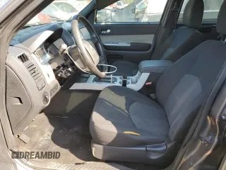 2009 Mercury Mariner with VIN 4M2CU81G69KJ18657, listed as a Copart auction lot 68869154 with 186,290 mi miles and Salvage title. Bid and sale history available at DreamBid. Image 7.