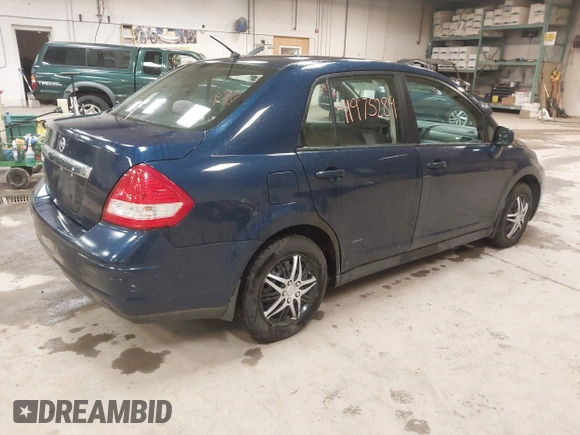 2009 Nissan Versa 1.8 S with VIN 3N1BC11E79L440560, listed as a IAAI auction lot 41975289 with 158,726 mi miles. Bid and sale history available at carsss.com. Image 4.