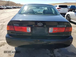 2000 Toyota Camry CE z VIN 4T1BG22K0YU699662, wystawiony jako Copart lot #47949165 z przebiegiem 270 179 mil mil oraz Szkoda całkowita • Salvage title. Historia ofert i sprzedaży dostępna na DreamBid. Obrazek 6.