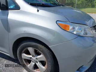 2011 Toyota Sienna LE AAS with VIN 5TDKK3DC2BS175598, listed as a IAAI auction lot 42186153 with 169,267 mi miles. Bid and sale history available at carsss.com. Image 22.