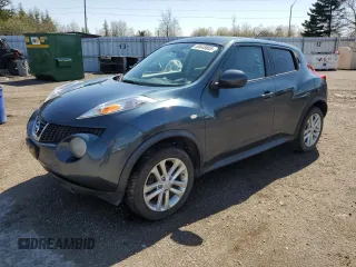 2012 Nissan Juke SL z VIN JN8AF5MV0CT112133, wystawiony jako Copart lot #55648805 z przebiegiem 265 478 mil mil oraz Tytuł czysty. Historia ofert i sprzedaży dostępna na DreamBid. Obrazek 1.