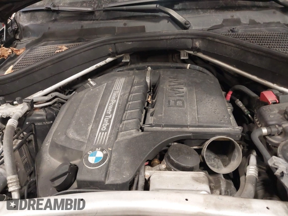 2012 BMW X5 35i with VIN 5UXZV4C50CL757568, listed as a IAAI auction lot 41315024 with 166,825 mi miles and . Bid and sale history available at DreamBid. Image 10.