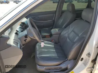 2001 Toyota Avalon XL with VIN 4T1BF28B11U171919, listed as a Copart auction lot 55977855 with 189,840 mi miles and Salvage Title. Bid and sale history available at DreamBid. Image 7.