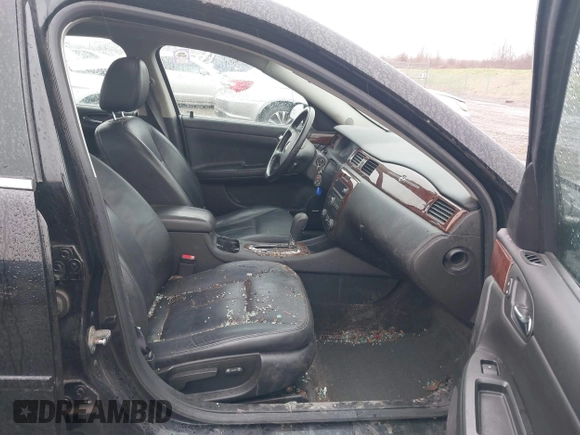 2011 Chevrolet Impala with VIN 2G1WG5EK9B1290896, listed as a IAAI auction lot 42001589 with 98,740 mi miles and . Bid and sale history available at DreamBid. Image 5.