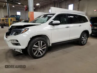 2017 Honda Pilot Elite with VIN 5FNYF6H05HB042234, listed as a Copart auction lot 51813235 with 124,950 mi miles and Salvage Title. Bid and sale history available at DreamBid. Image 1.