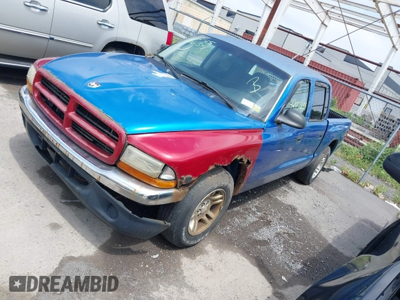 2001 Dodge Dakota Sport z VIN 1B7GL2AN31S115001, wystawiony jako IAAI lot #42452634 z przebiegiem Nie podano mil oraz . Historia ofert i sprzedaży dostępna na DreamBid. Obrazek 2.