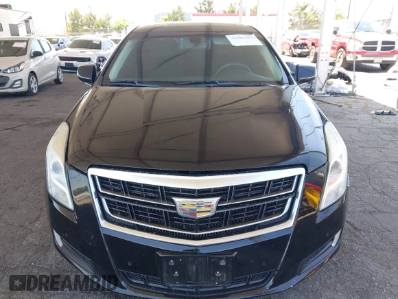 2013 Cadillac XTS Luxury with VIN 2G61P5S35D9105460, listed as a IAAI auction lot 42582313 with 144,895 mi miles and . Bid and sale history available at DreamBid. Image 12.