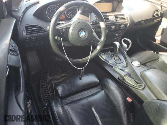 2007 BMW 6 Series 650i z VIN WBAEH13577CR52351, wystawiony jako Copart lot #72886154 z przebiegiem 77 410 mil mil oraz Szkoda całkowita • Salvage title. Historia ofert i sprzedaży dostępna na DreamBid. Obrazek 8.